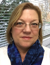 Dr. Lois �Rocki� Adrian-Hollier