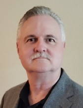 Larry E. Stevens